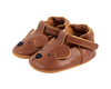 A pair of Donsje Baby Bear Shoes designed to resemble mice, featuring small ears, eyes, and a nose on the toe area, along with a Velcro fastening strap, set against a black