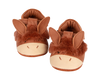 A pair of whimsical children's slippers designed to look like brown donkeys, featuring floppy ears and stitched faces, complete with a velcro fastening strap, isolated on a transparent background.