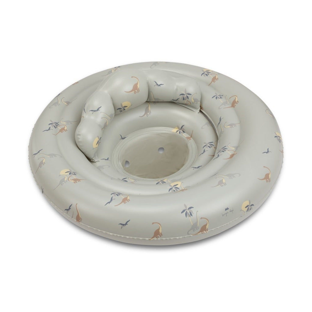 Inflatable Baby Swim Ring - Dinosaur Print made of durable PVC, featuring a gray background and colorful dinosaur print, viewed on a white surface.