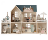 A detailed Maileg Dollhouse with various rooms and furnishings. Each room is occupied by animal-themed dolls engaged in different activities like reading, sleeping, and cooking.