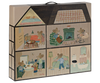 Illustration of a wooden block puzzle depicting scenes of mice in various activities inside a Maileg Farmhouse Dollhouse, such as cooking, dining, and washing, drawn in a charming, detailed style.