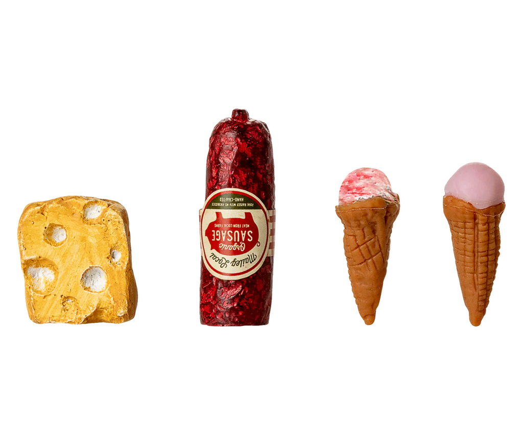 A block of Swiss cheese, a wrapped sausage, and two pink ice cream cones are displayed on a beige background—perfect for imaginative Maileg Mouse tales with the PRE-ORDER: Fridge, Mouse - Off White (Aprox. Ship Date: Early October).