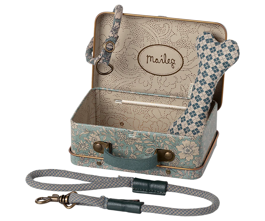 The Maileg Puppy Supply Accessories - Blue features a small metal suitcase with a charming print, a blue and white checked fabric bone, and a matching leash with brass clasp—perfect for your plush dog.
