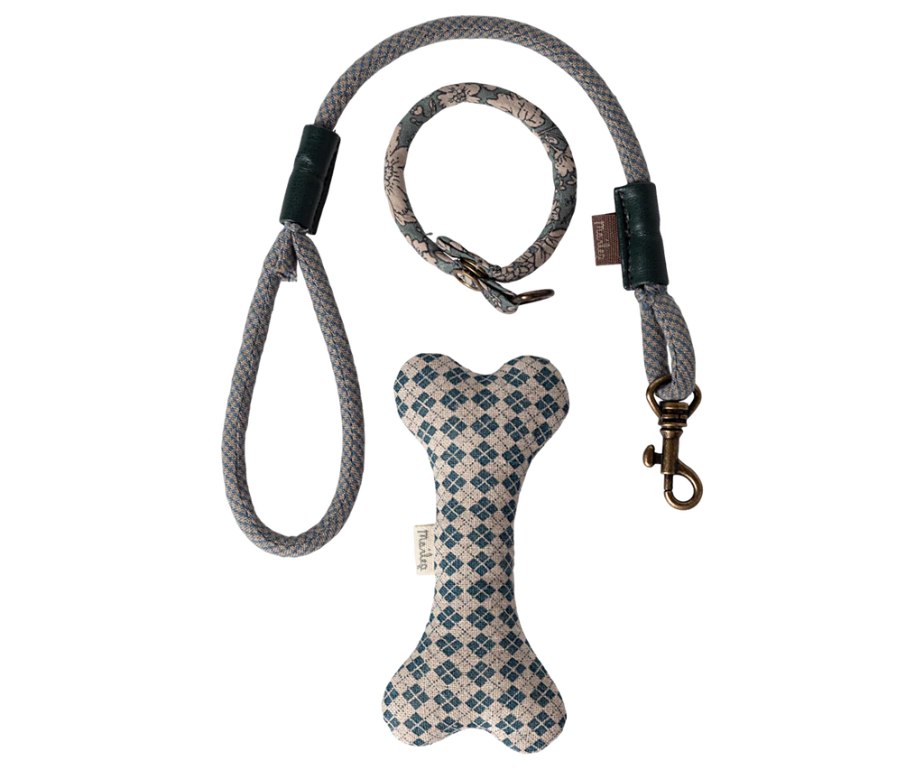 A textured gray and white leash with a matching collar is paired with a blue and white checkered Maileg Puppy Supply Accessories - Blue bone toy, perfect for your soft plush dog.