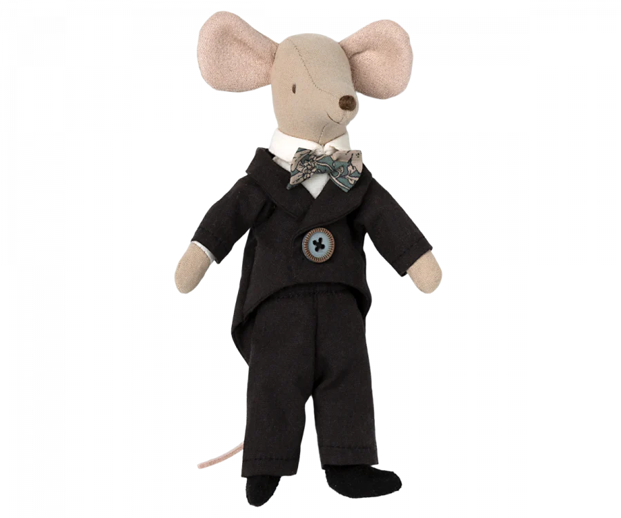 A plush Maileg Wedding Mice Couple in Box dressed in a black suit and white shirt, featuring a bow tie and decorative badge, standing against a plain background. This toy Maileg Wedding Mice Couple in Box is part of our delightful Maileg mice collection.