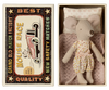 An image of a Maileg Little Sister mouse in matchbox made of fabric, wearing a floral dress, placed inside a small matchbox bed featuring vintage-style graphics with text "best mouse race" and "grand old match".