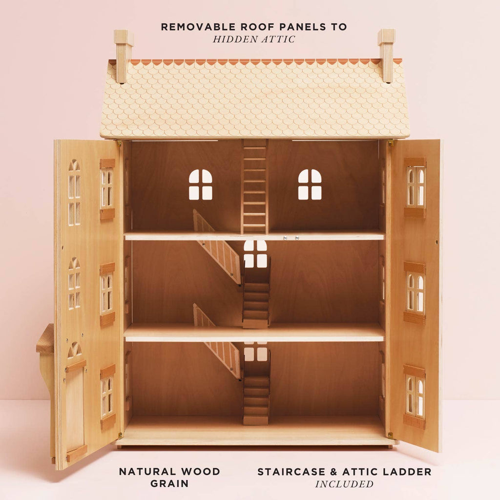 The Grand Natural Wood Doll House features three floors, an attic, open front doors, a staircase, attic ladder, removable roof panels, and visible windows. Crafted from sustainable wood—perfect for imaginative play.