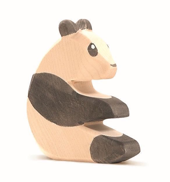 The Ostheimer Panda Bear, Sitting is a handcrafted wooden toy with painted cartoon-like details and black markings. Made with non-toxic materials, it features natural wood colors for the ears and limbs—ideal for safe, imaginative play.