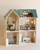 A detailed Maileg Dollhouse with open walls featuring a living room, bedroom, and kitchen, decorated with Maileg furniture and accessories.