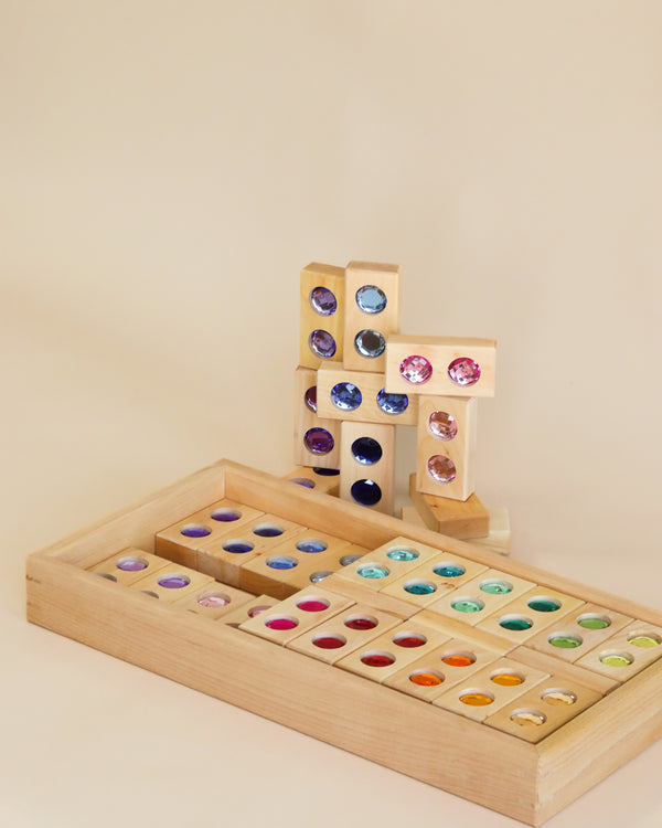 Wooden tray with rectangle wooden blocks and gem inserts
