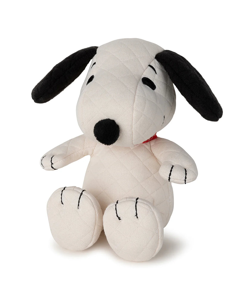 This charming Peanuts Snoopy Plush Toy in a gift box features Snoopy sitting with a quilted white body, black floppy ears, a black nose, stitched eyes, and a red collar, making it an adorable addition to any plush collection.