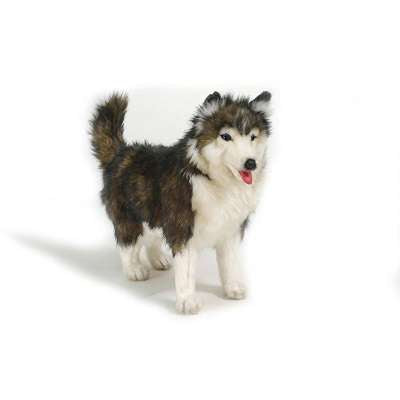 The Husky Dog Stuffed Animal is a realistic plush toy with fluffy brown, black, and white fur, standing on all fours with its mouth open and tongue out—a hand-sewn piece full of unique personality.