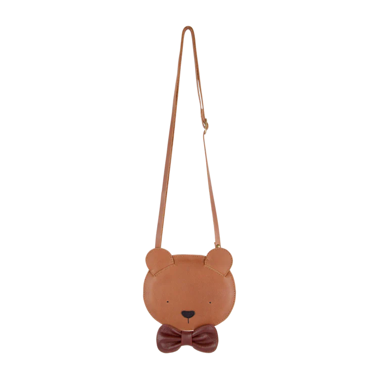 A whimsical Donsje Britta Exclusive Purse | Winter Bear-shaped leather purse with a detailed face, ears, and a bowtie, displayed against a plain white background. The purse has a long, adjustable strap.