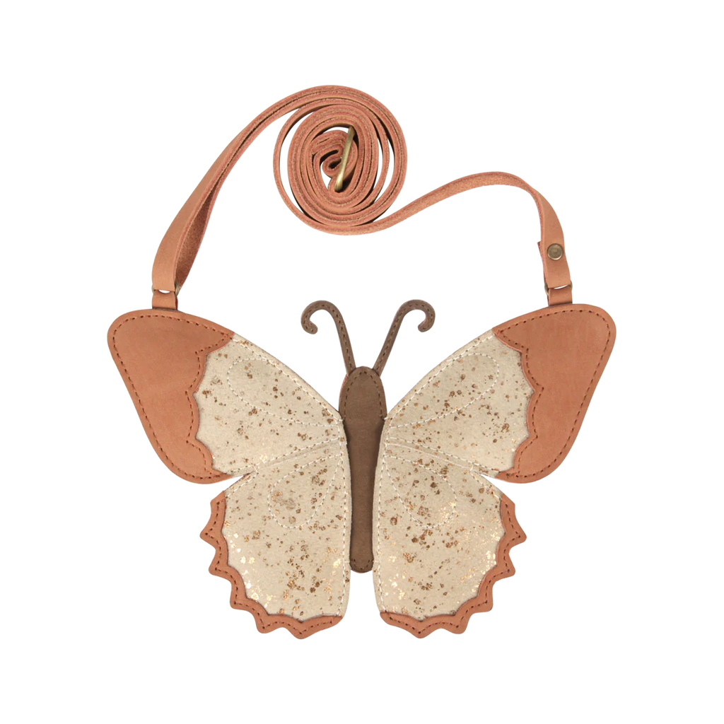A whimsical butterfly-shaped Donsje Toto purse with a tan and cream color scheme, featuring an adjustable leather strap and textured wing details, set against a striped background.