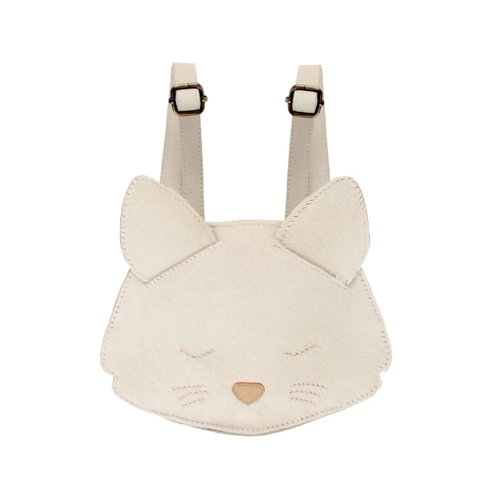 A Donsje Mini Leather Backpack - Cat, a small, beige premium leather cat-shaped backpack with subtle facial features and pointed ears, featuring adjustable straps and a stitching design.