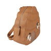 A tan leather Donsje School Leather Backpack - Beehive isolated on a white background, featuring a prominent front zipper and tassel details.