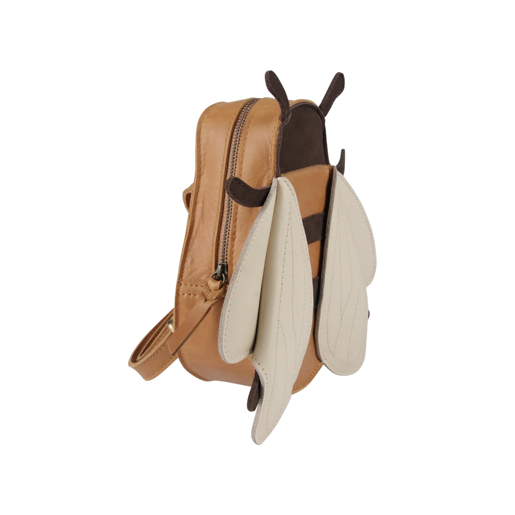 A unique Donsje Bee Backpack designed to look like a bee, handcrafted with 100% Premium Leather, featuring tan and black panels with white wing details, zipper closure, and adjustable straps.
