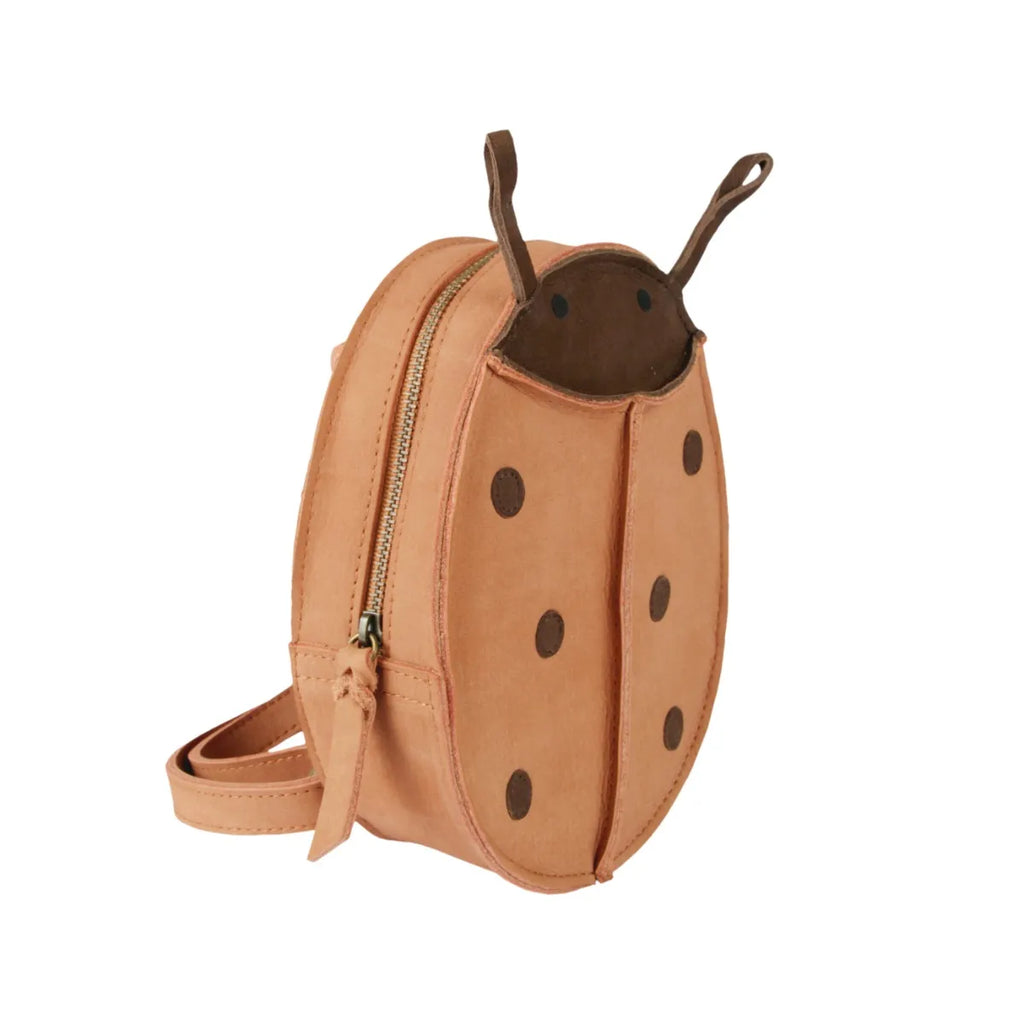 A Donsje Mini Leather Ladybug Backpack in light brown and dark brown, crafted from 100% leather, featuring a zippered closure and adjustable shoulder strap.