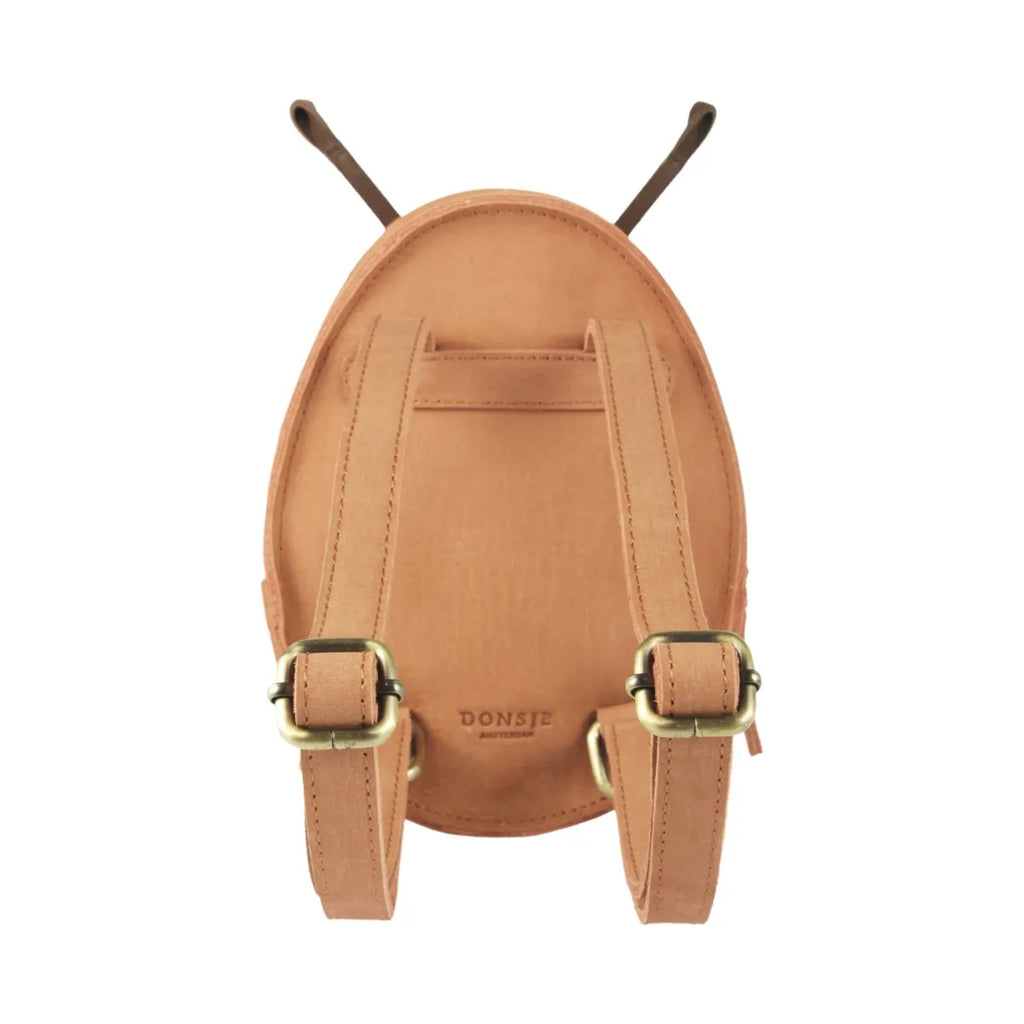 A light brown Donsje Mini Leather Backpack - Ladybug with the design of an insect, featuring two antennae protruding from the top and adjustable shoulder straps.
