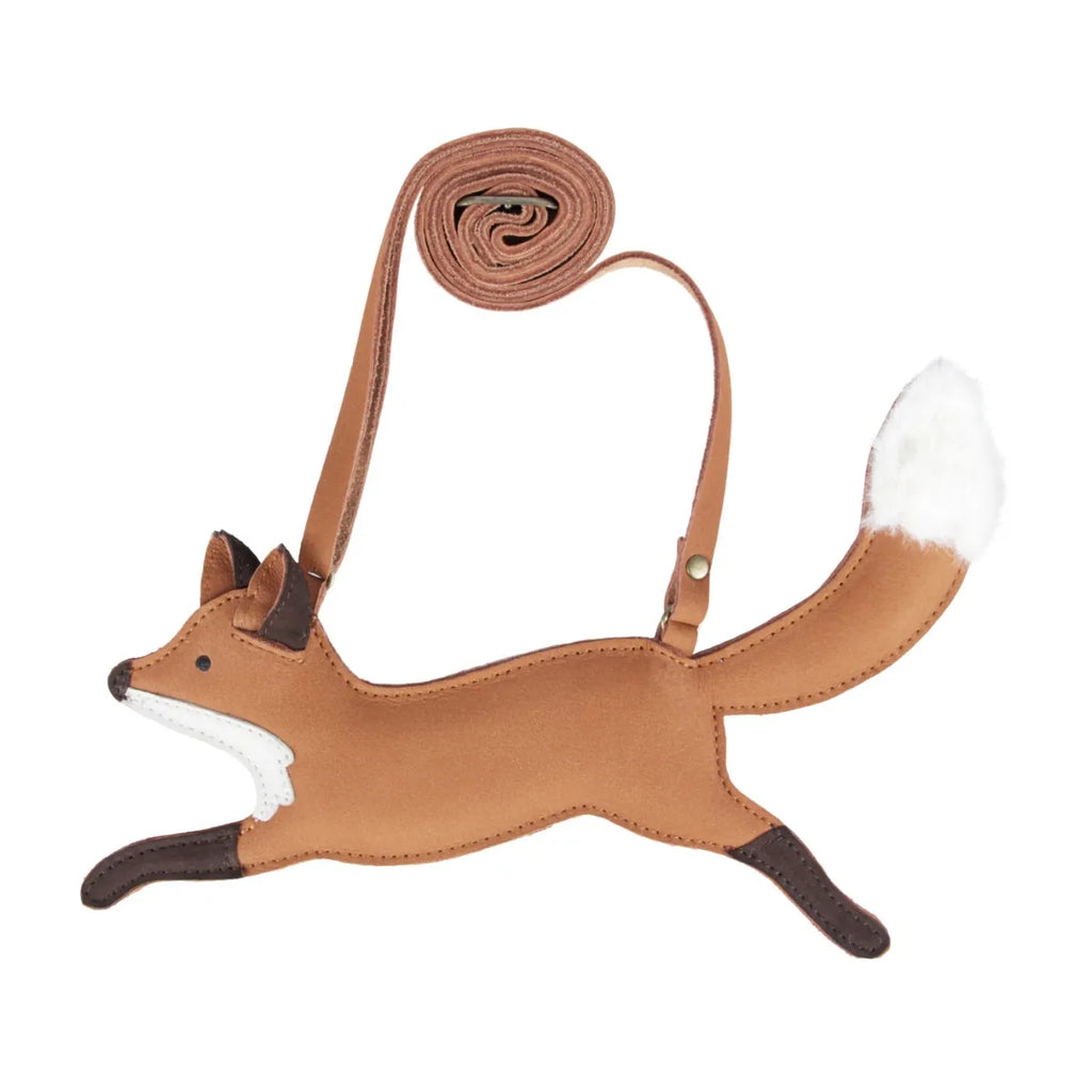 A whimsical Donsje Jimp Purse - Fox shaped like a fox in a leaping pose, featuring an adjustable leather strap, white fur detail on the tail, and stitched accents.