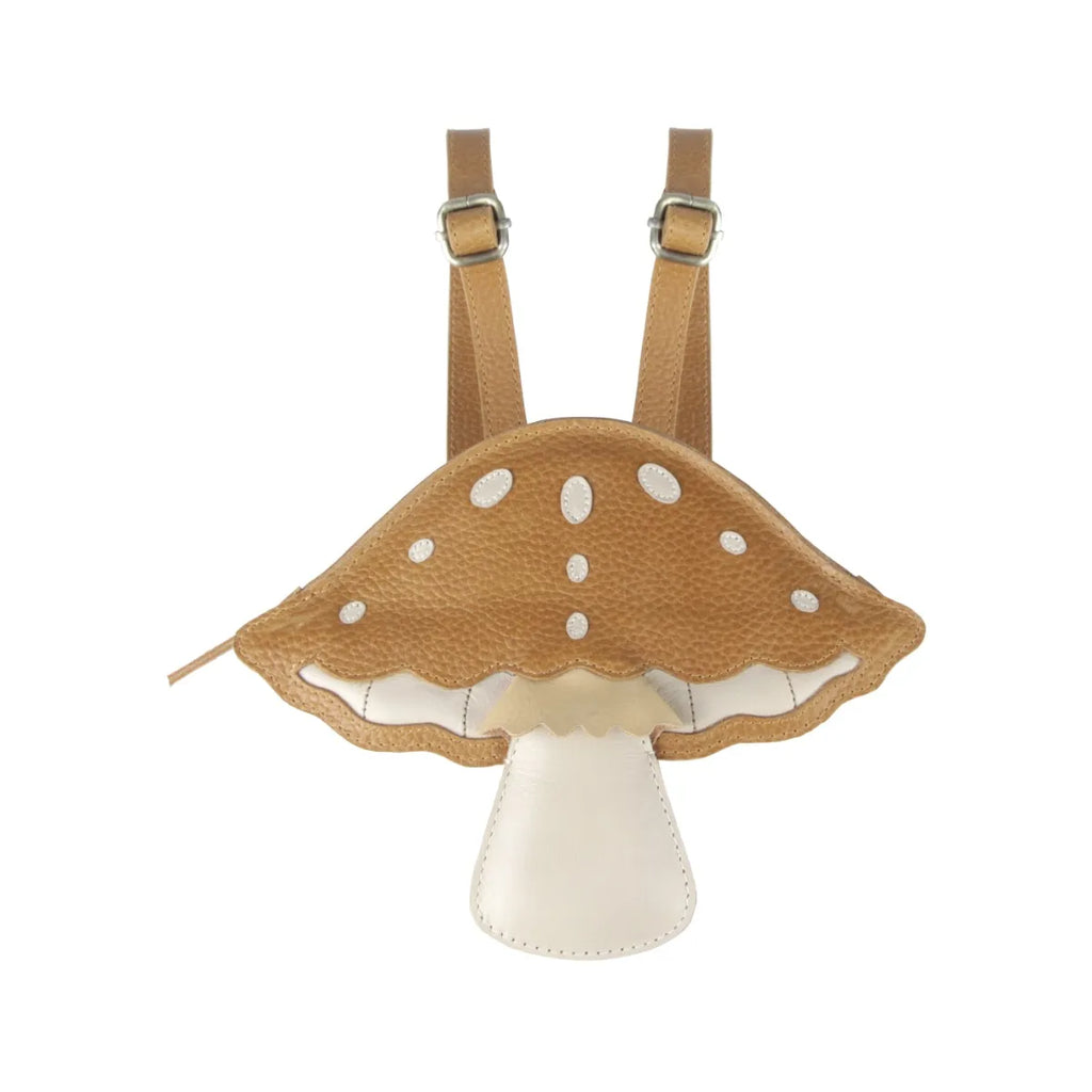 A whimsical, handmade Donsje Tum Backpack - Mushroom with a tan cap dotted with white specks, adjustable beige straps, and a contrasting white stalk.