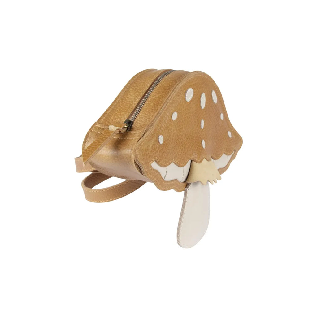A small, whimsical Donsje Tum Backpack - Mushroom designed to look like a slice of pie, complete with a crust edge and dollops of cream, against a white background. This unique item is handmade and fairtrade.