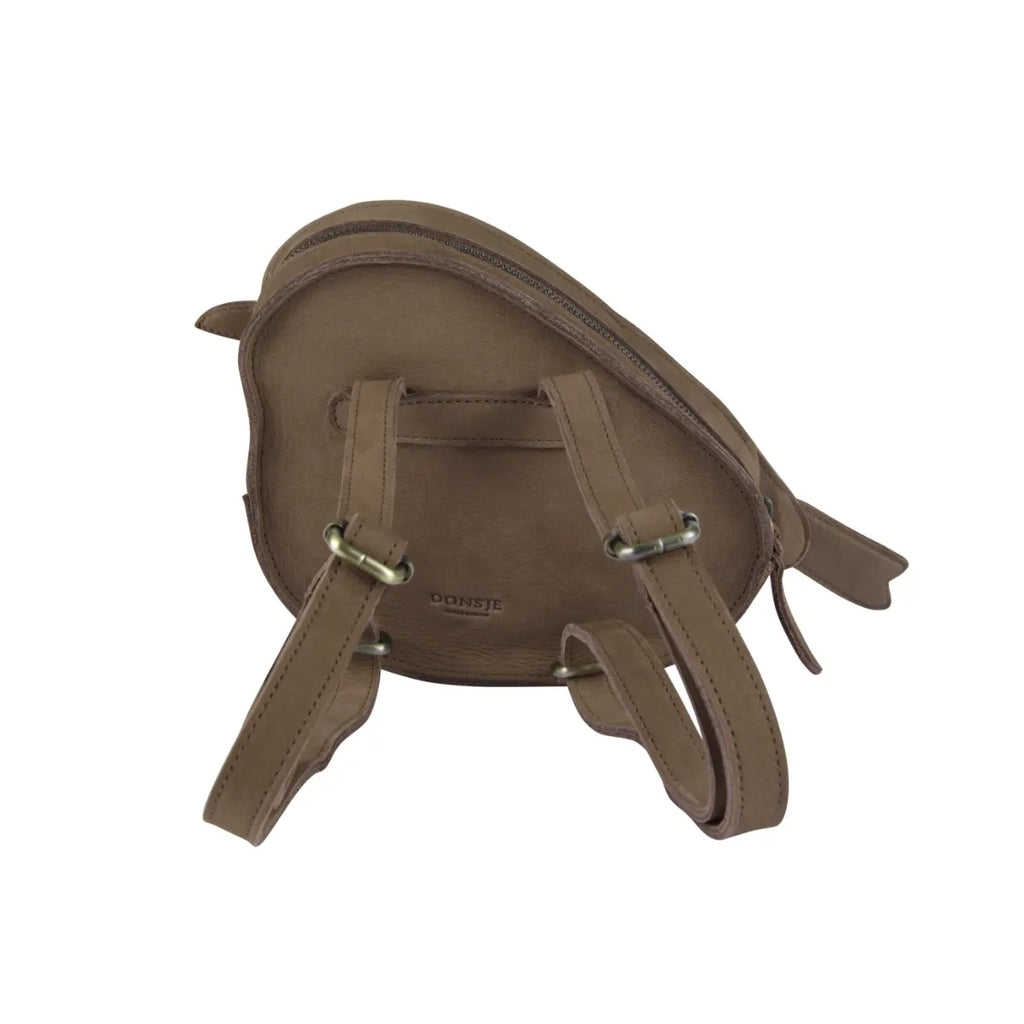 A brown premium leather Donsje Woodsy Backpack - Robin with a zipper and adjustable strap, featuring silver-tone hardware and embossed with the brand name 'donste'.