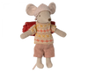 A Maileg Farmhouse - Fully Furnished stuffed toy mouse wearing a checkered hat, an orange sweater, and pink shorts, standing against a black background.