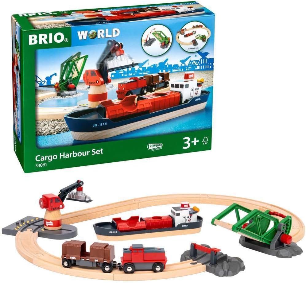 The BRIO World Train Set Cargo Harbour Set is a toy for ages 3+, featuring a wooden track, cargo ship, crane, trucks, and accessories. The box shows the assembled harbour set with illustrated play scenes.