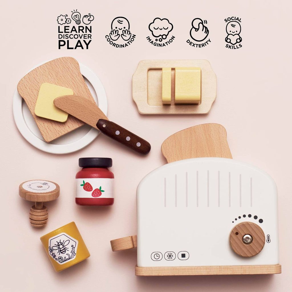 The Pop-up Toaster & Breakfast Set ships in one week and includes bread, butter, honey, jam, and utensils made from FSC-certified wood. Icons highlight its benefits: coordination, imagination, dexterity, and social skills for pretend play.