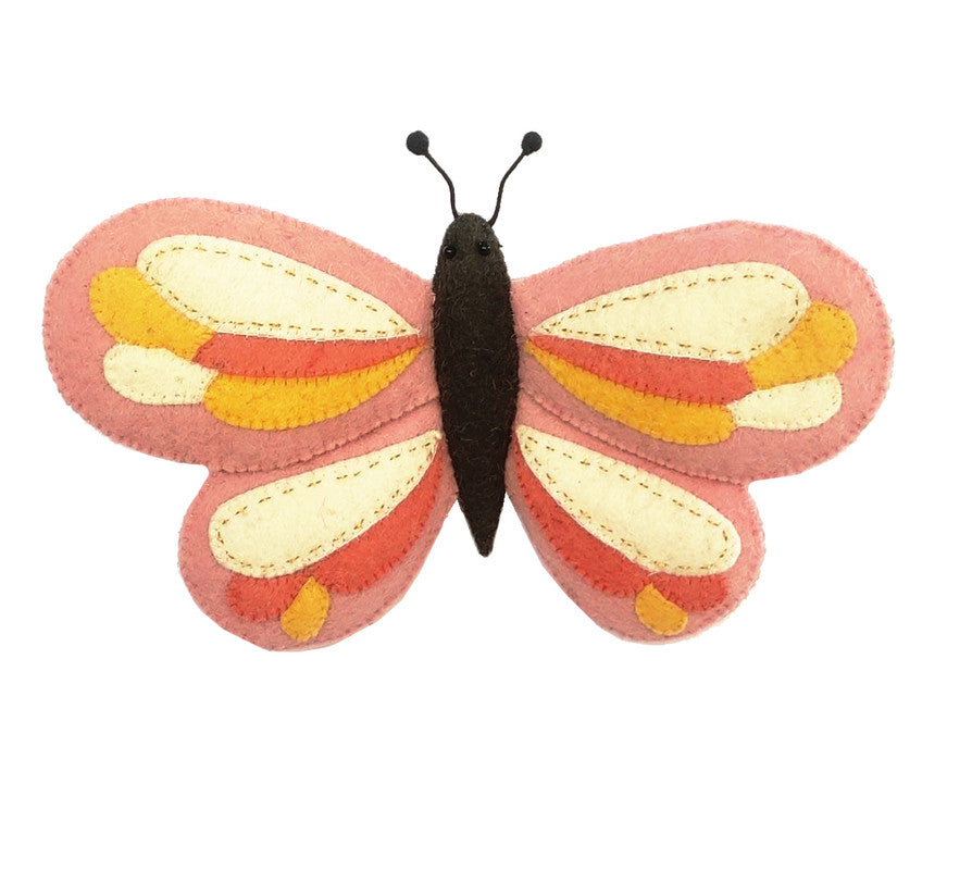 A colorful Handcrafted Felt Butterfly Wall Decor, ethically made, with symmetrical pink and yellow wings, adorned with orange and cream accents, isolated on a white background.