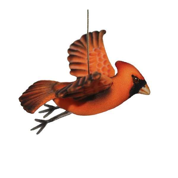 The Cardinal Flying Bird Stuffed Animal is a hanging ornament shaped like a red cardinal with outstretched wings, detailed feathers, and a black face mask, handcrafted to resemble HANSA animals and suspended by a thin string.