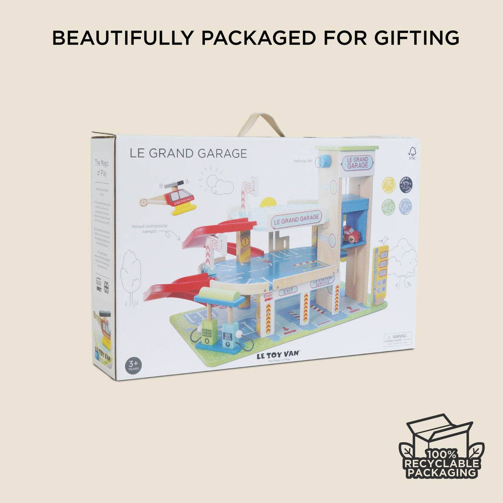 Le Grand Wooden Garage is a beautifully boxed toy set featuring colorful illustrations of a wooden garage, perfect for imaginative play and gifting, and comes in 100% recyclable packaging.