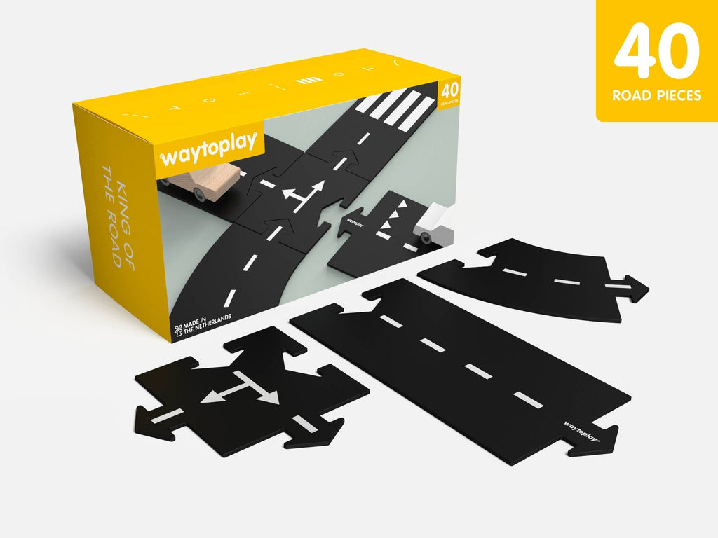 The WaytoPlay: Extra Long Flexible Road Set - King of the Road features a box with "King of the Road" and "40 road pieces," offering flexible black interlocking tracks with white markings for imaginative play and problem-solving skills.