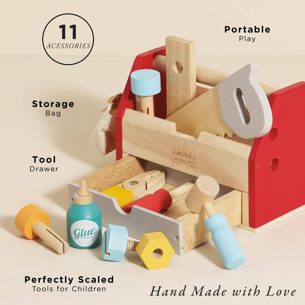 The Tool Box & Wooden Tools set for early years includes 11 colorful accessories—like a saw, hammer, and glue bottle. Portable and handmade with love, it features built-in storage and helps develop fine motor skills.