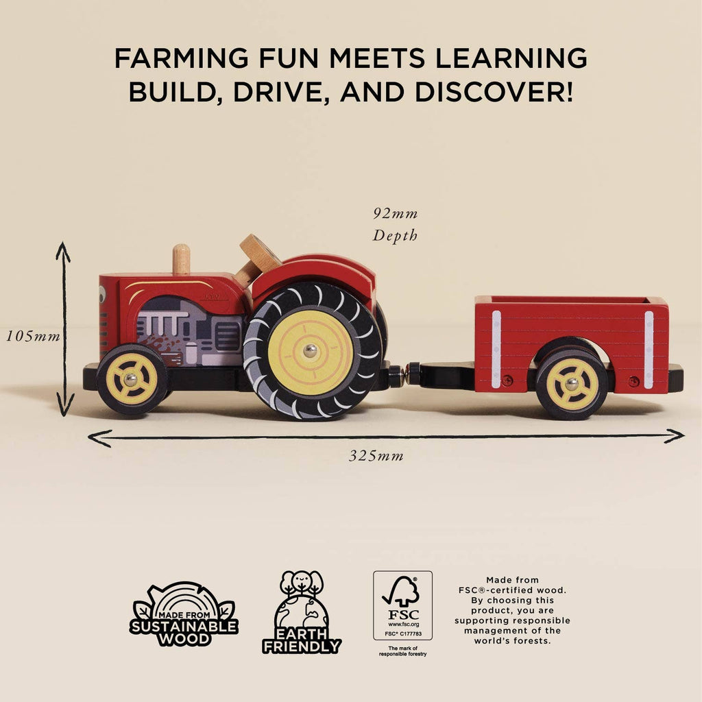 The Farmyard Tractor & Trailer is a red wooden toy with a detachable magnetic trailer, sized 105mm tall, 325mm long, and 92mm deep. Crafted from sustainable wood, it's earth-friendly and FSC certified.