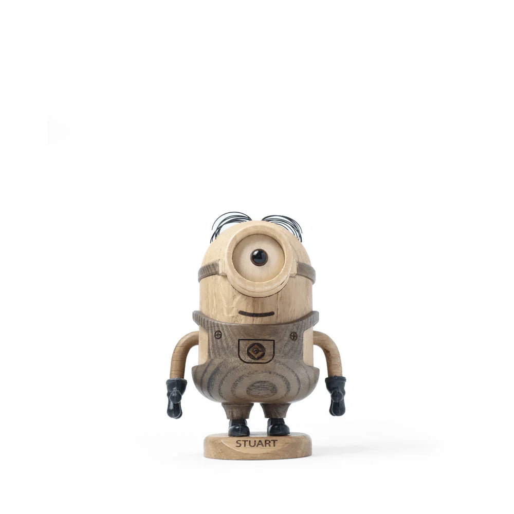 Boyhood Minions Stuart, Small: A collectible figurine of a one-eyed Stuart Minion made from European FSC White Oak with black gloves and coiled wire hair, stands on a labeled "STUART" base against a white background.
