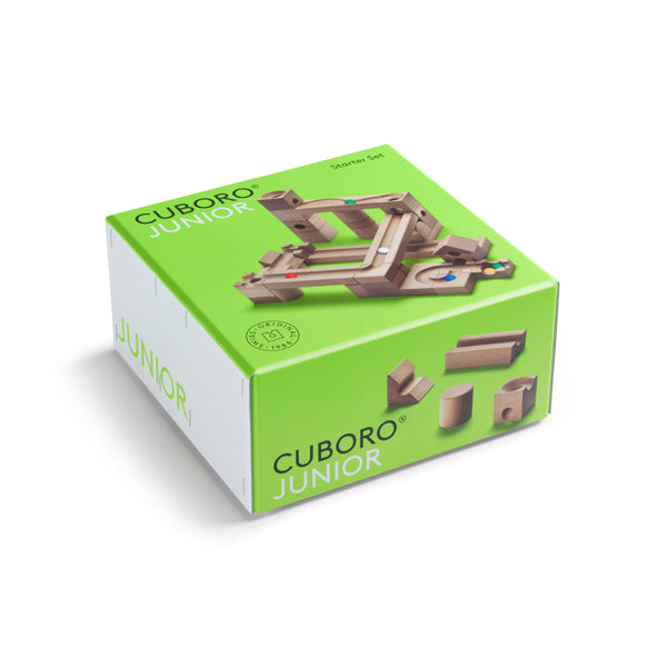 A Cuboro Junior Marble Run Starter Set boxed, showcasing various wooden blocks and track pieces on a clean, white background. The box features green accents and displays the product name prominently.