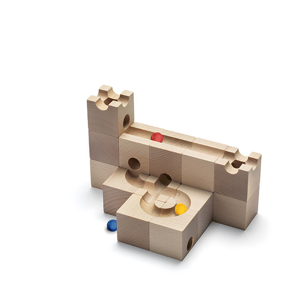 Cuboro 16 Marble Run Starter Set forming a small castle, featuring a basic labyrinth with red, blue, and yellow balls on a white background.