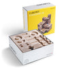 An open Cuboro 50 Marble Run Starter Set wooden track game set next to its closed packaging, featuring the same image of the assembled track on a gray background.