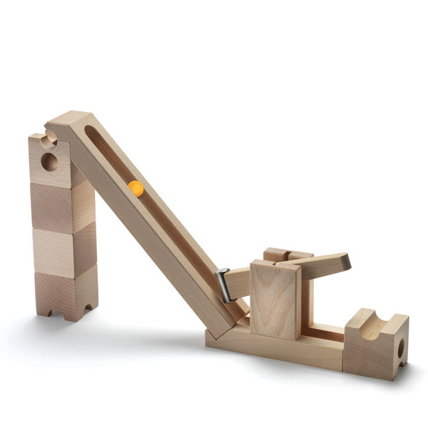 A Cuboro Kick Marble Run Extra Set model isolated on a white background, featuring moveable pieces, a stable base, and marbles ready to roll, designed to enhance problem-solving skills.