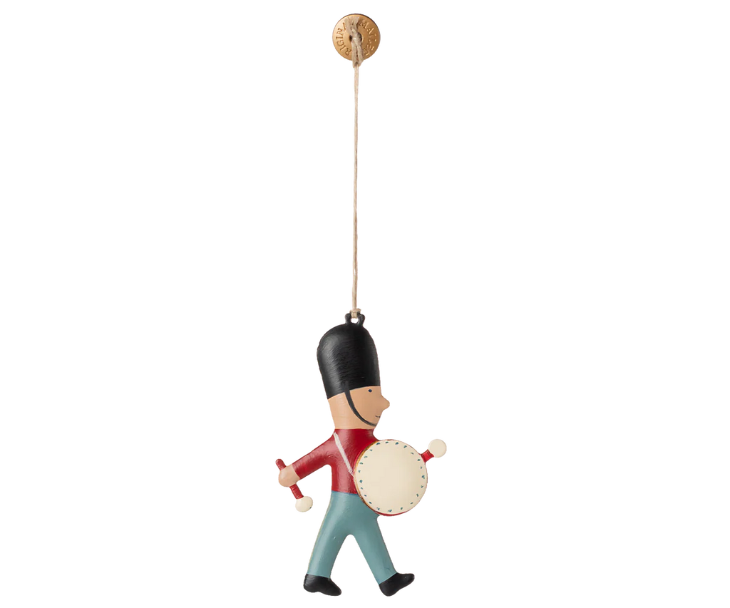 The Maileg Metal Ornament, Guard - Drum (ships in one week) features a charming soldier with drum, perfect for decorating your Christmas tree.