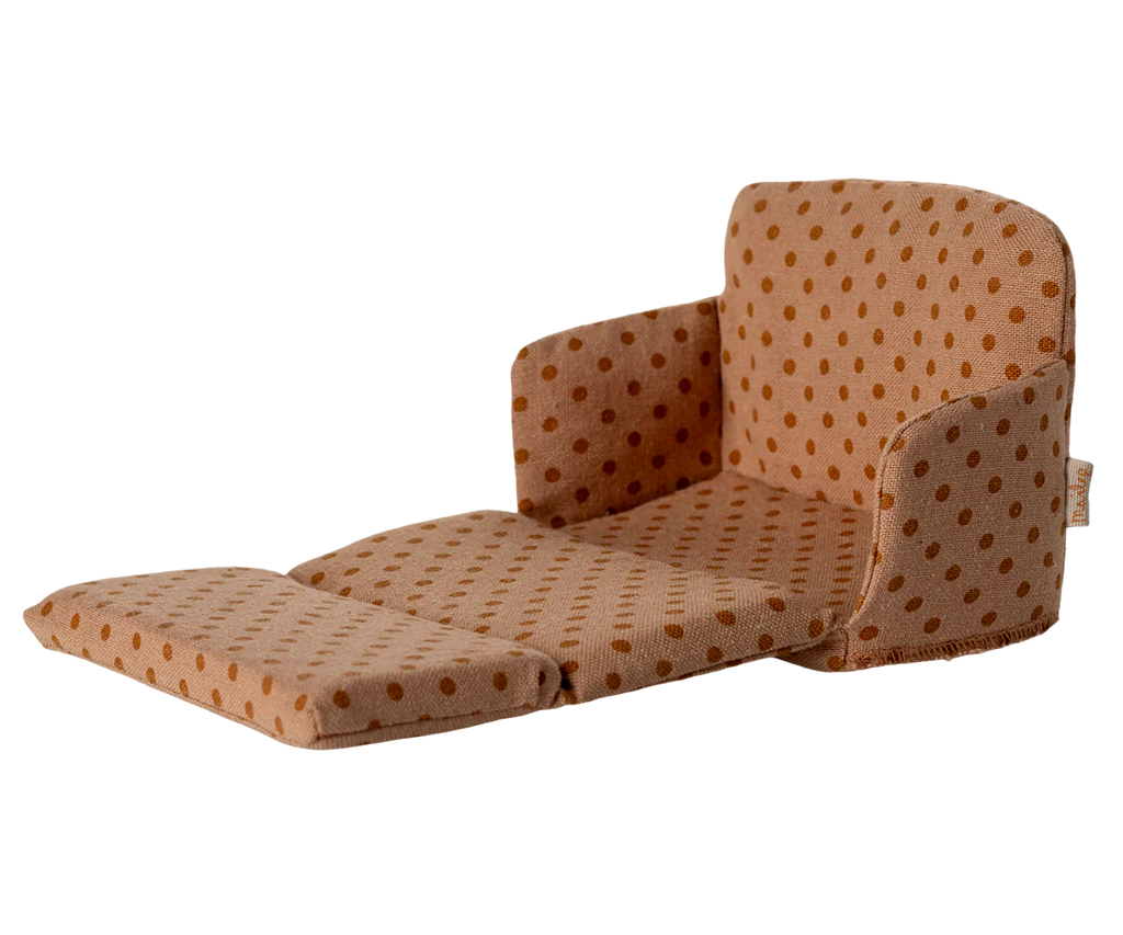 PRE-ORDER the Sofa Bed, Mouse - Dots, featuring light brown fabric with orange polka dots. This miniature recliner has an extended footrest and padded armrests—perfect for a cozy SuitCasa living room. Estimated ship date: Late September.