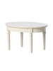 A simple oval white coffee table with four legs from the Maileg Farmhouse - Fully Furnished set, isolated on a white background.
