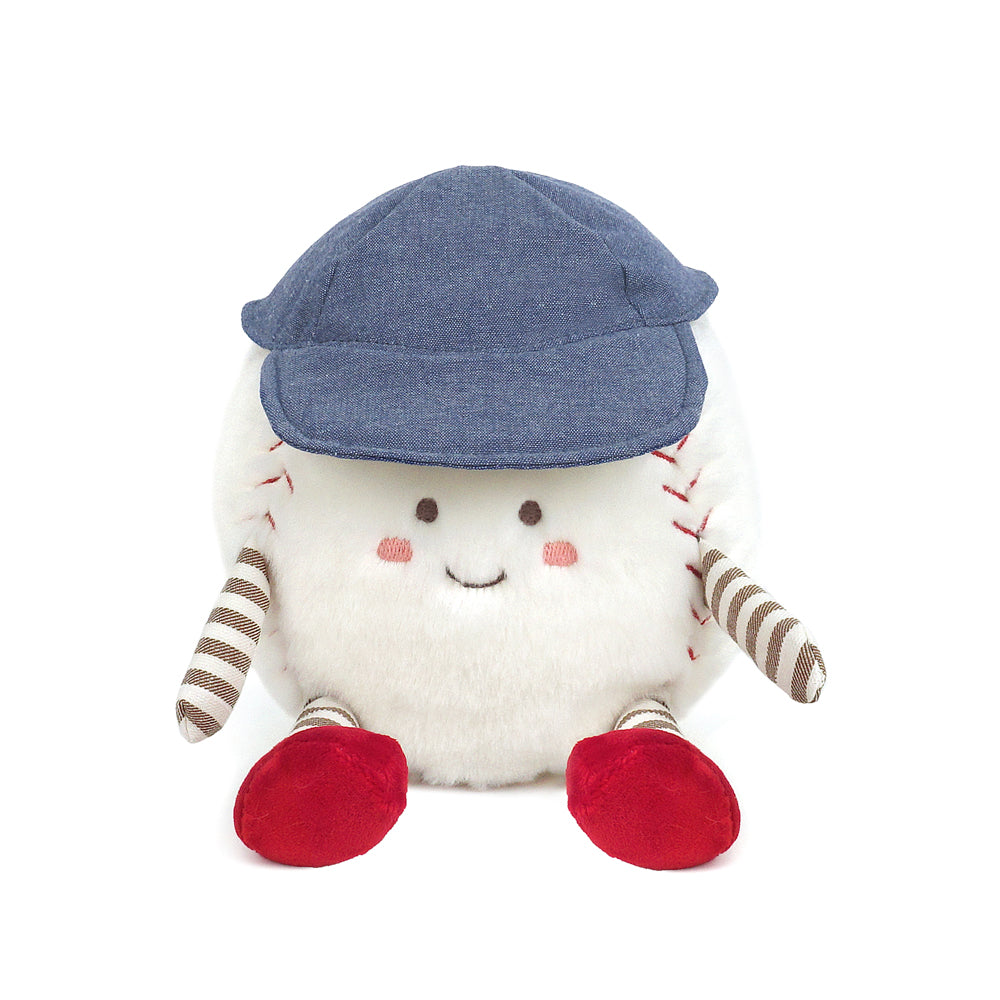 The Mon Ami Buddy Baseball Plush Toy features red stitching, striped arms, red feet, a smiling face with rosy cheeks, and a blue cap—perfect as a cuddle gift or playtime companion.