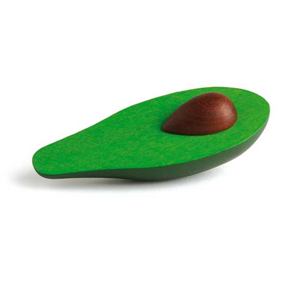 A 3D illustration of a green, grassy surface shaped like a paint palette, with a single brown Erzi Avocado Half Fruit Pretend Food resting in a depression, isolated on a white background.
