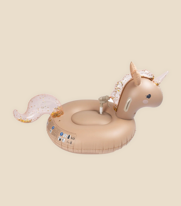 Inflatable Water Splasher Float - Unicorn with a golden horn, glitter-filled wings and tail, depicted on a soft beige background, made from durable PVC.