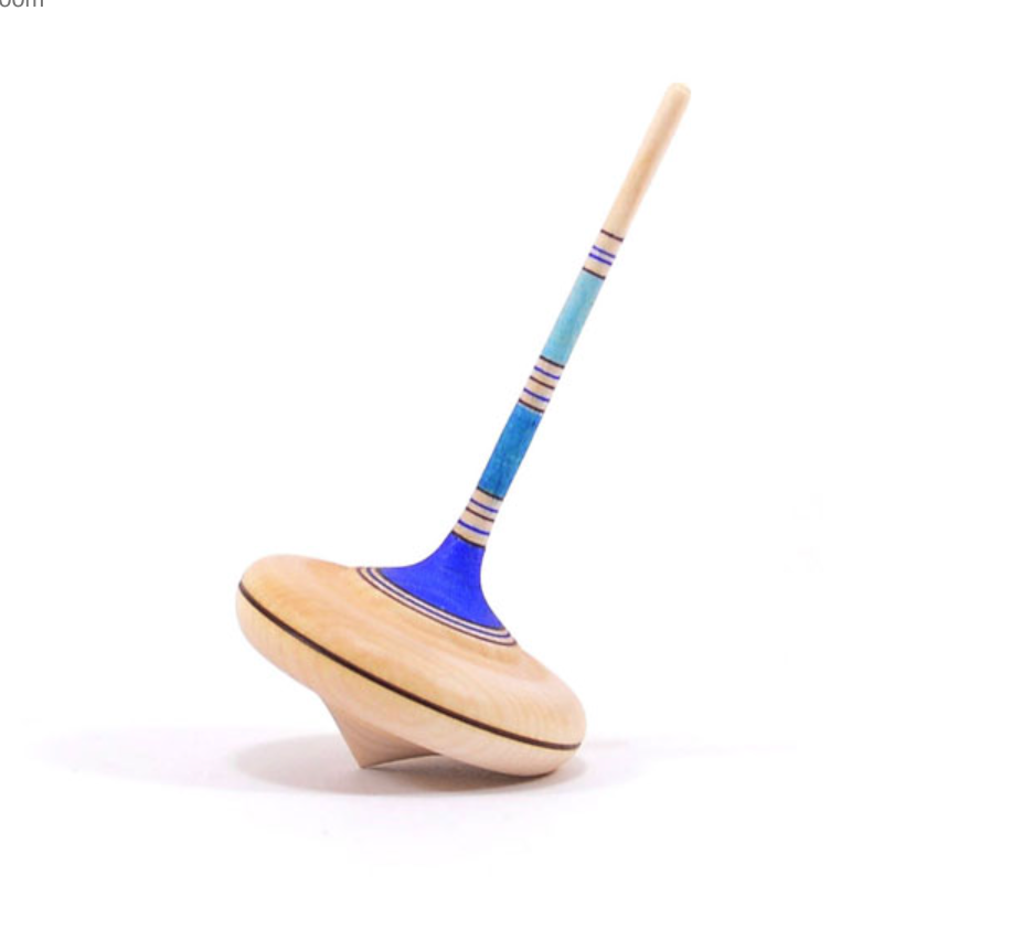The Mader Spaghetti Spinning Top - Blue features a maple wood body with a light natural base and blue accents, designed for toy safety and long-lasting enjoyment. It stands upright on a white background.