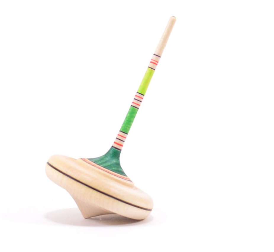 The Mader Spaghetti Spinning Top - Green, crafted from maple wood with a slender handle and green and red stripes, stands tilted on a white background, showcasing the timeless charm and safety of this classic toy.