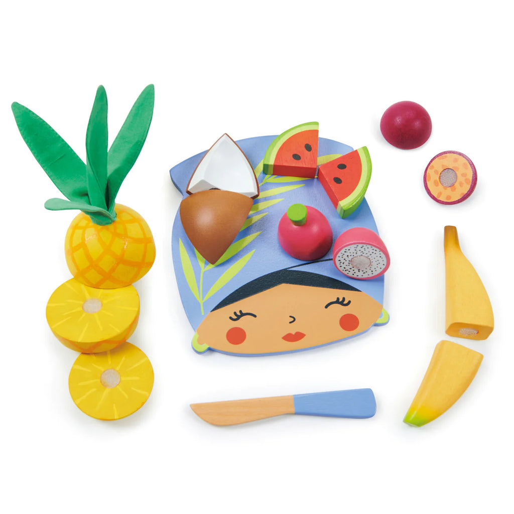 Colorful Tropical Fruit Chopping Board set featuring a face shaped as a plate surrounded by tropical themed fruit pieces like banana, pineapple, dragon fruit, apple, and watermelon, with a wooden knife included for easy cutting.